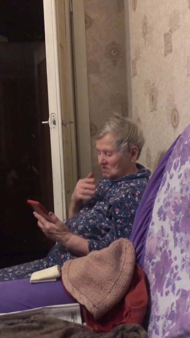 Grandma swiping her phone green screen