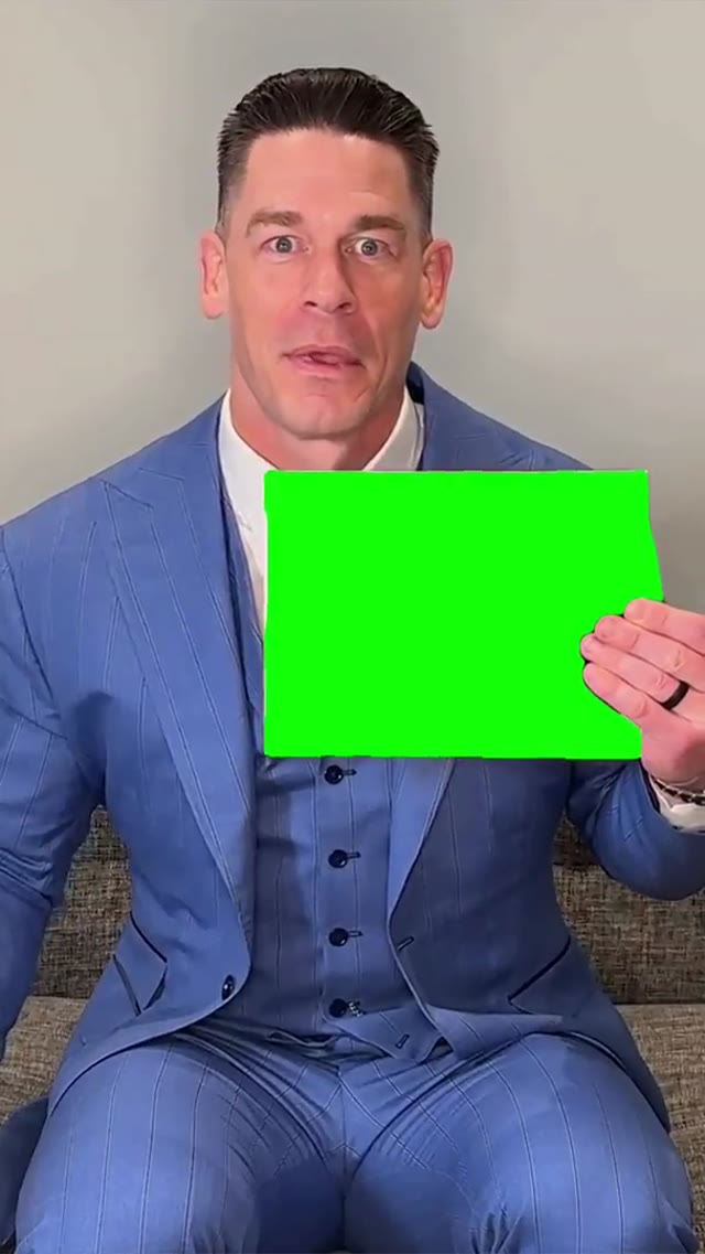 John Cena holding a sign  green screen
