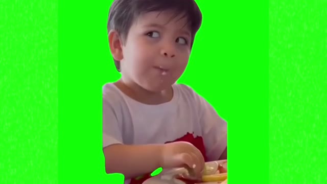 Kid smirking green screen