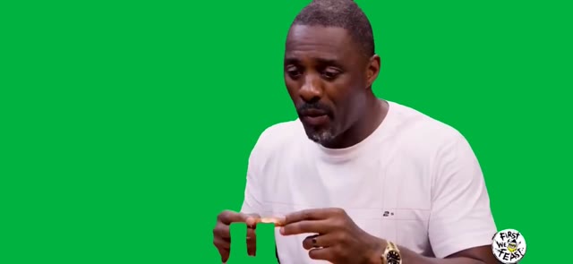 Man in White T-Shirt Explaining green screen